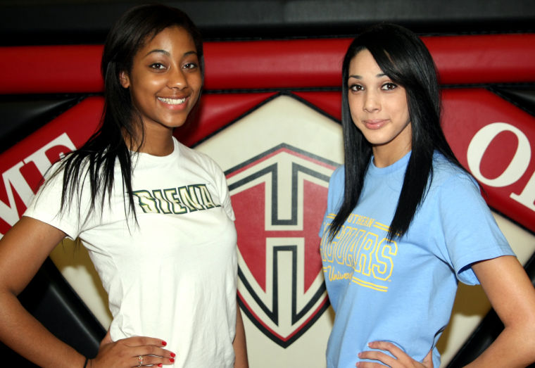 Heights volleyball duo sign with DI schools